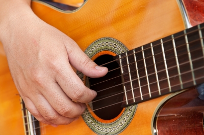 http://www.freedigitalphotos.net/images/Music_g290-Guitar_And_Hand_p38764.html